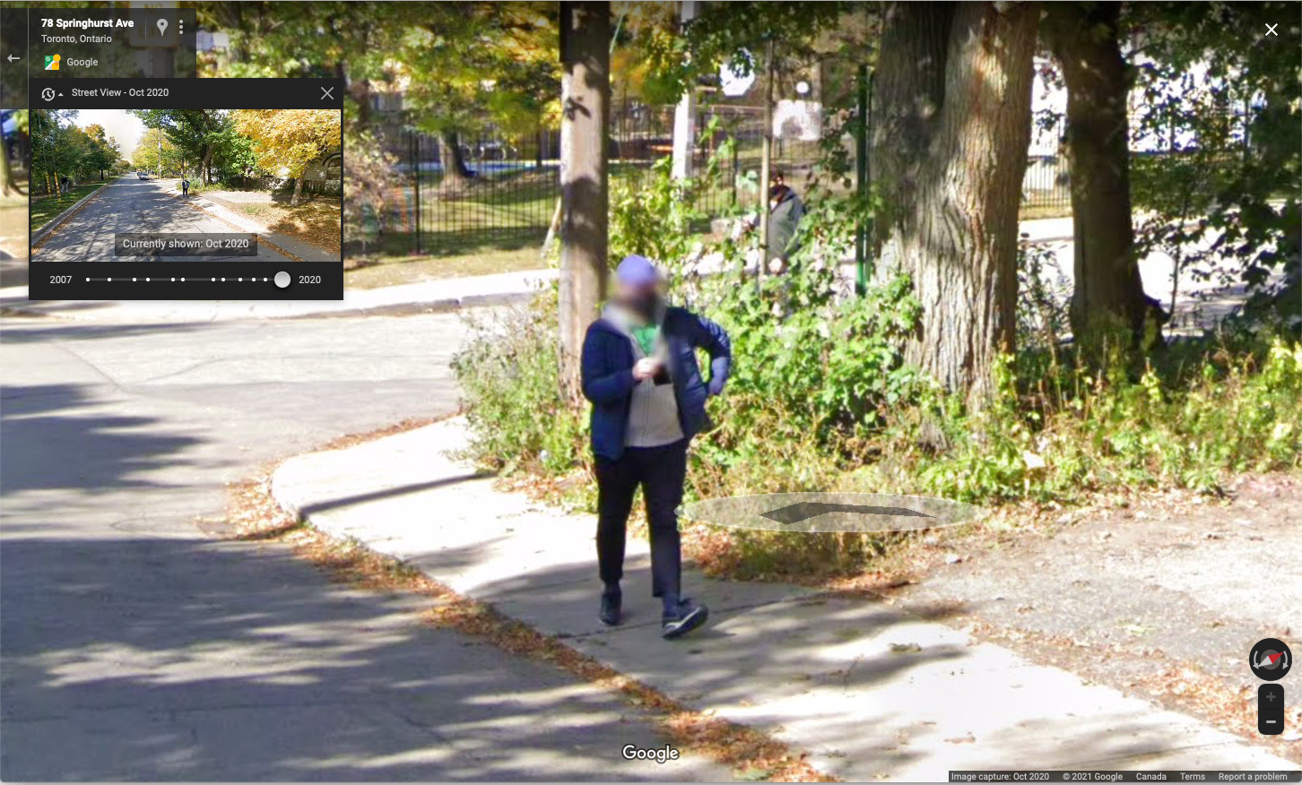 a google streetview image of a person walking